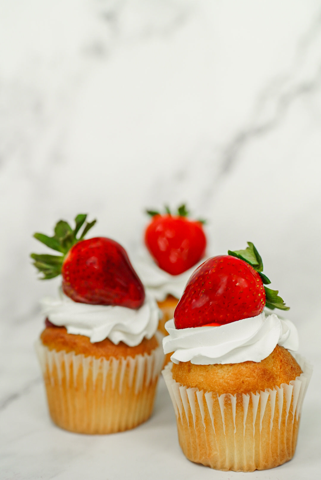 Cup cake Vainilla relleno de fresa